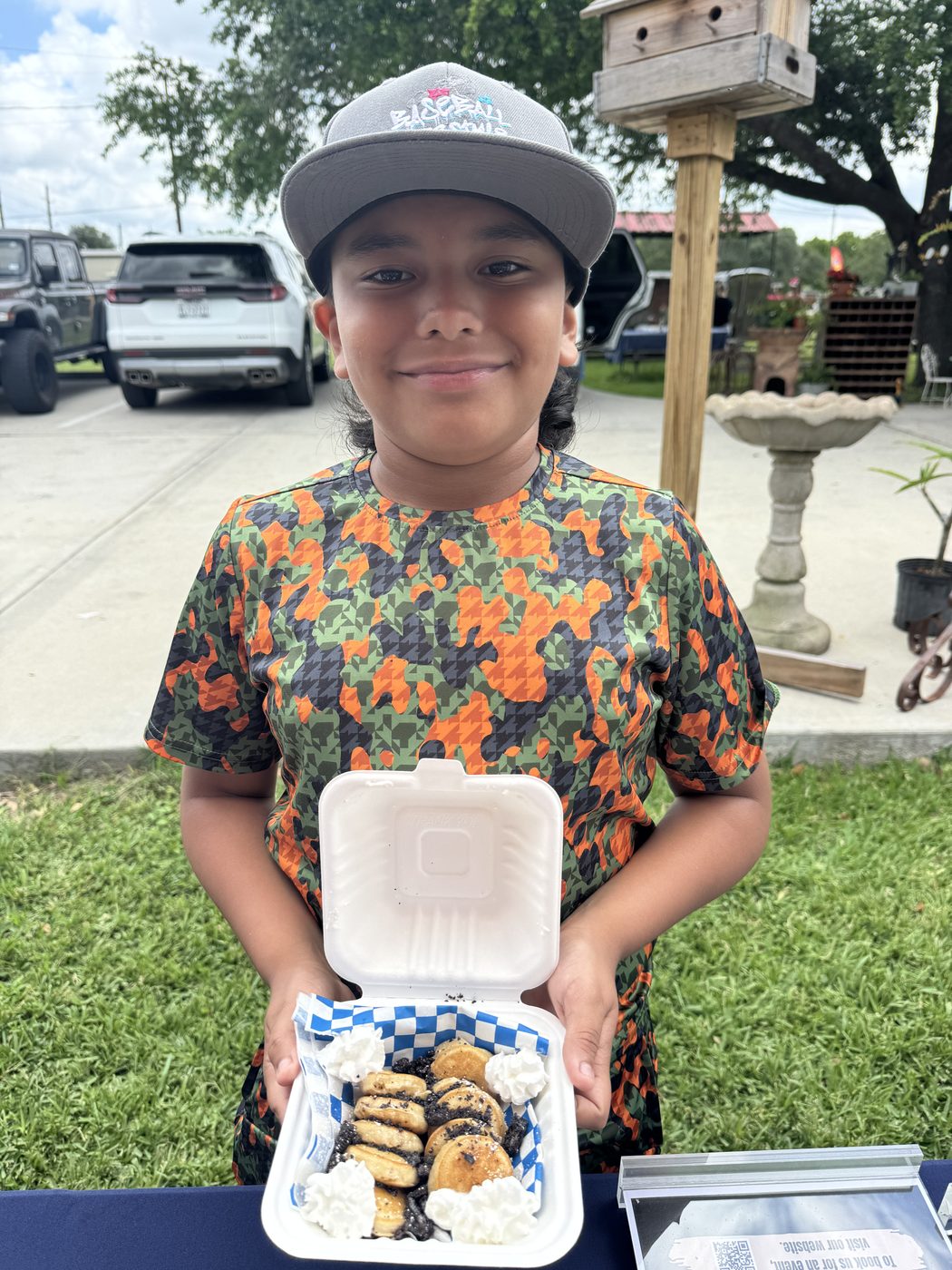 A customer with a cookies and cream mini-stack